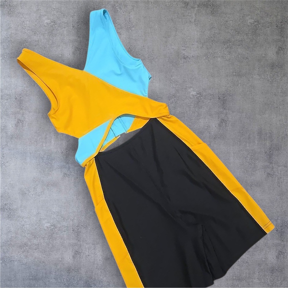 Outdoor Voices Colorblock Cutout Jumpsuit in Yellow, Black & Light Blue